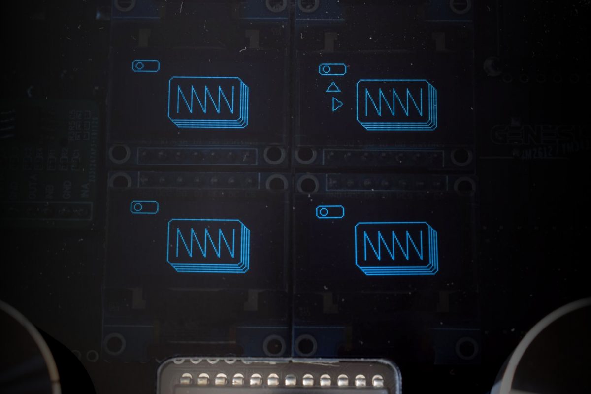 The four blue OLED operator displays of the DAFM synth GENESIS YM2612 / YM3438 glowing in the dark